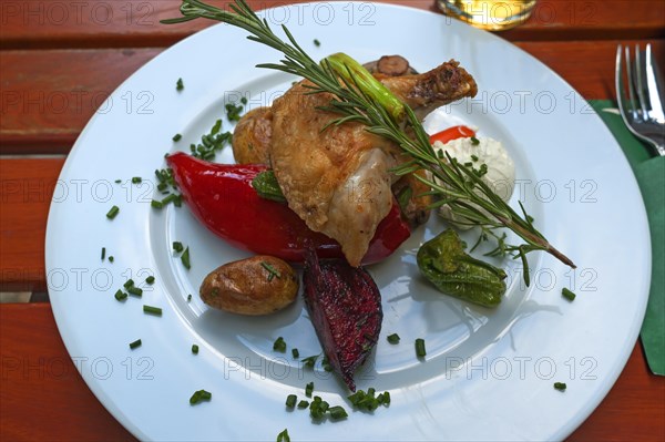 Chicken legs and vegetables