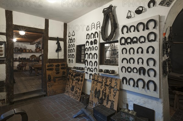 Exhibition rooms with horseshoes in the Deutsches Hirtenmuseum or German Shepherds Museum