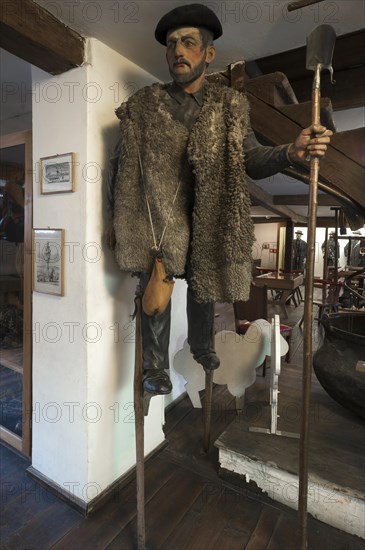 Figure of a french shepherd on stilts