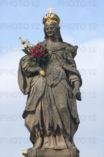 Statue of Empress Kunigunde with a bunch of roses