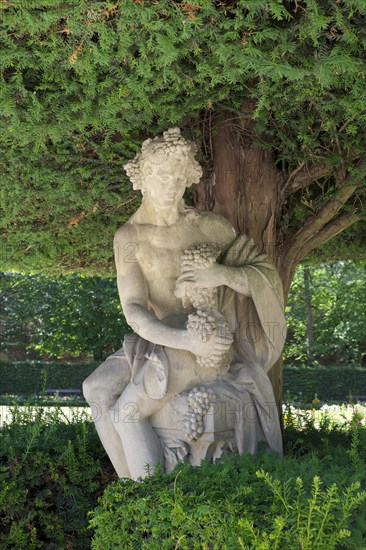 Sculpture of Bacchus in the courtyard garden