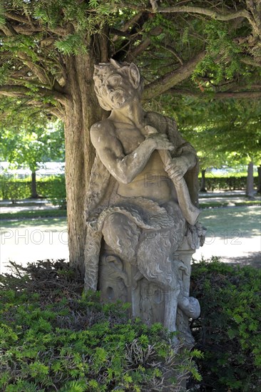 Statue of a Faun in the courtyard garden