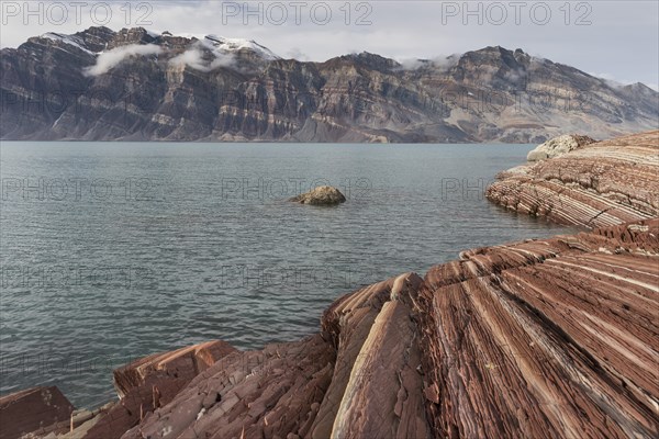 Unfolded coloured rock strata