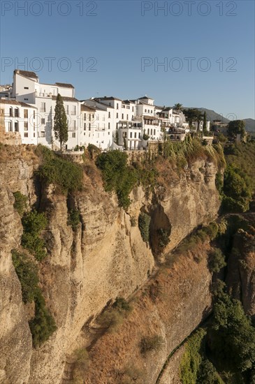 Whitewashed houses atop El Tajo Gorge Canyon