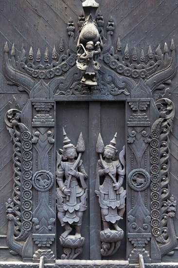 Detail of woodcarvings at the Shwe In Bin monastery in Mandalay