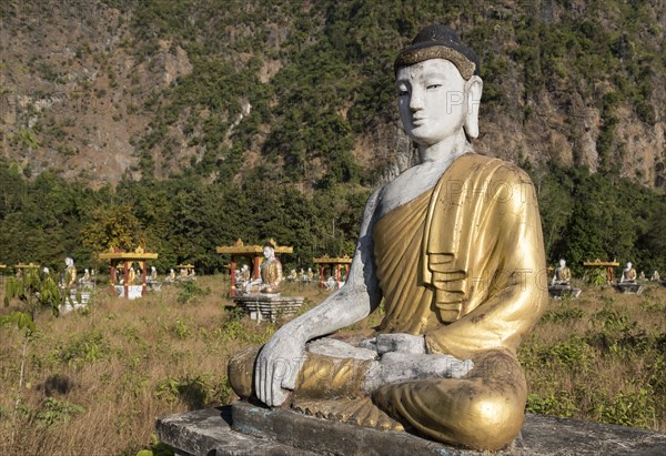 Buddha statue in Lumbini Garden under Mt Zwegabin