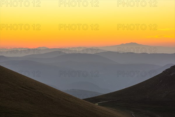 Views of the Sibillini Mountains at sunset from Castelluccio di Norcia