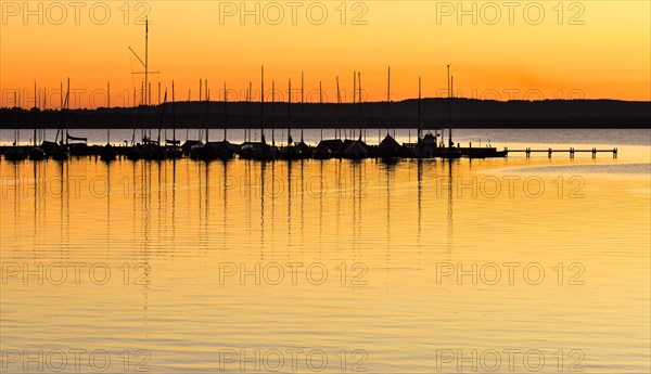 Jetty and sailing boats