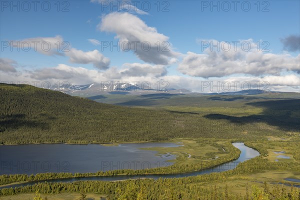 View of river and mountains belonging to Tarraatno Sarek National Parks