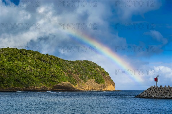 Rainbow above an islet off Ofu Island