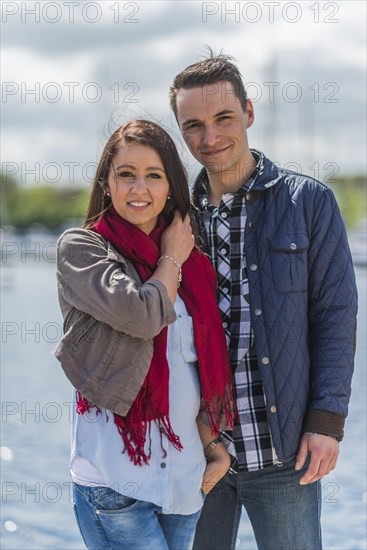 Young couple at the marina