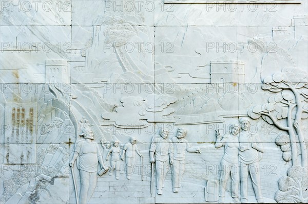 Marble relief depicting people