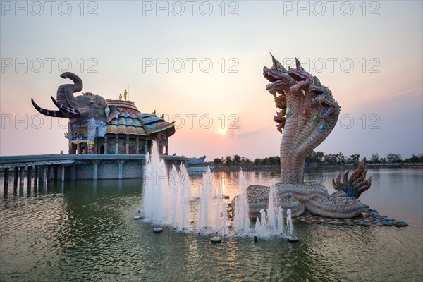 Seven-headed Naga serpent and fountain in front of the Elephant Temple Thep Wittayakhom Vihara