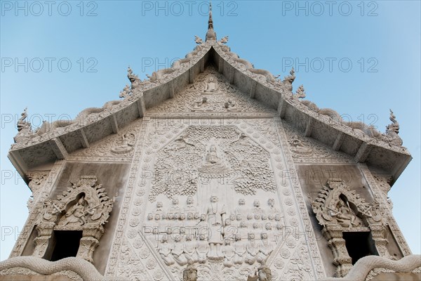 Relief at the bot of the Wat Huay Pla Kang temple