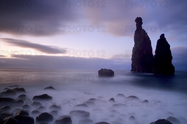 Volcanic rock formation Ilheus da Rib by the cliffs of Ribeira da Janela