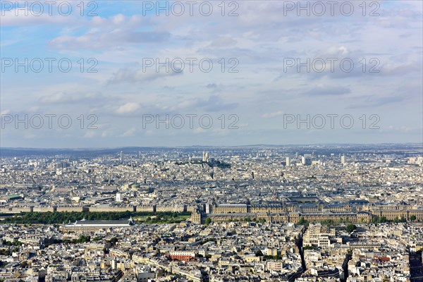 Cimentiere de Montparnasse and city centre with Louvre and Montmartre