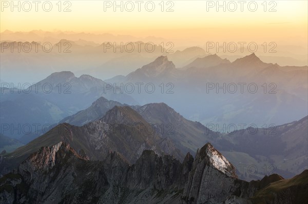 Evening mood at the blue hour on the Santis with a view of the Alps of Eastern Switzerland