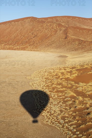 Shadow of a hot-air balloon in the Namib Desert