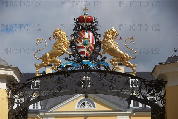 Family crest above the portal