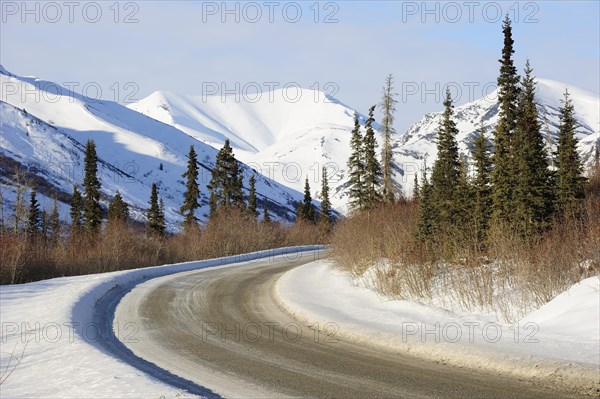 The Dalton Highway crosses the Brooks Range in the Arctic winter