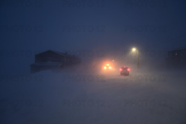 Street in the hurricane during the polar night