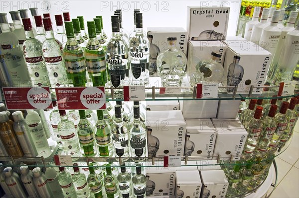 Shelf with vodka bottles