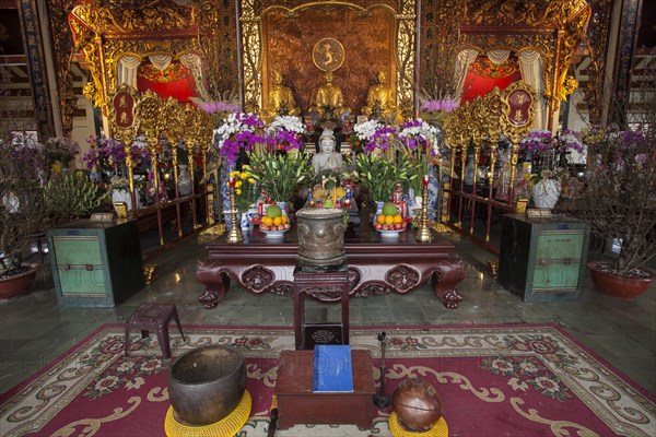 Buddha statue and altar in Chua Vinh Pagoda