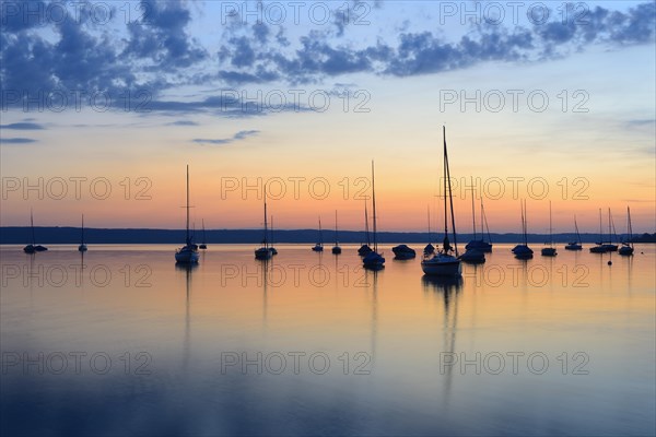 Sailboats at sunset