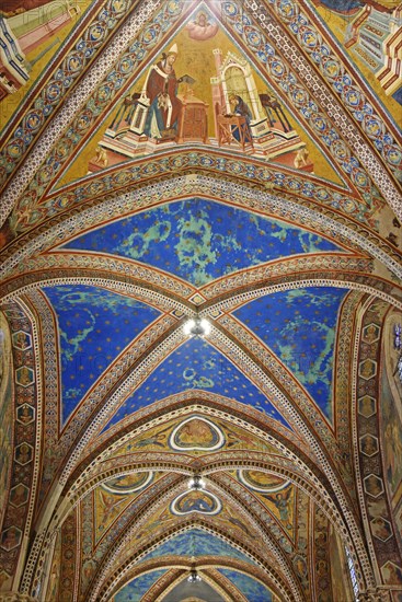 Ceiling vaults decorated with frescoes in the upper church of San Francesco Basilica