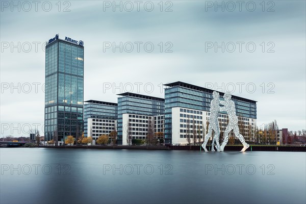 Treptowers with Allianz Tower by the River Spree