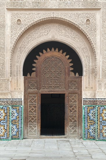 Ornate portal made of cedar wood