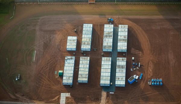 Construction of refugee containers on the sports ground