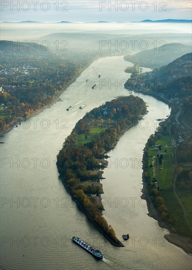 Rhine with cargo ships in the mist