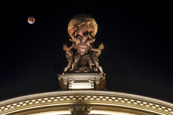 Sculpture of Atlas carrying globe