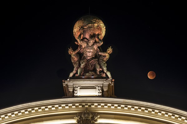 Sculpture of Atlas carrying globe