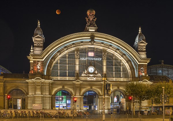 Total lunar eclipse above central station entrance