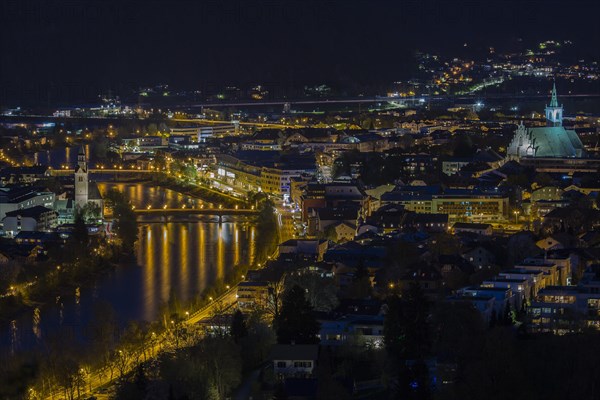 View of the town at night with Spitalkirche am Inn left and Stadtpfarrkirche right