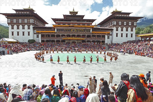 Dancers and spectators at the Tashichho Dzong monastery festival