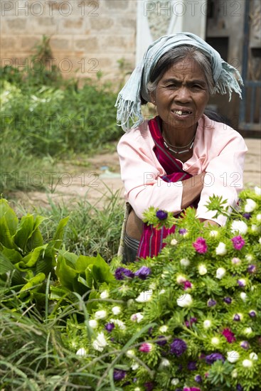 Woman sells flowers