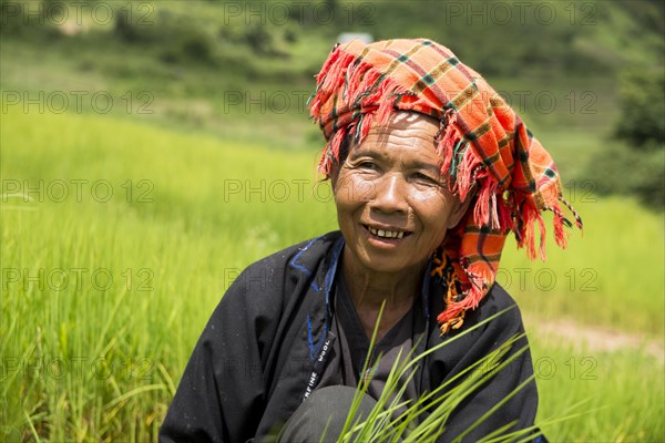 Smiling woman working in the fields