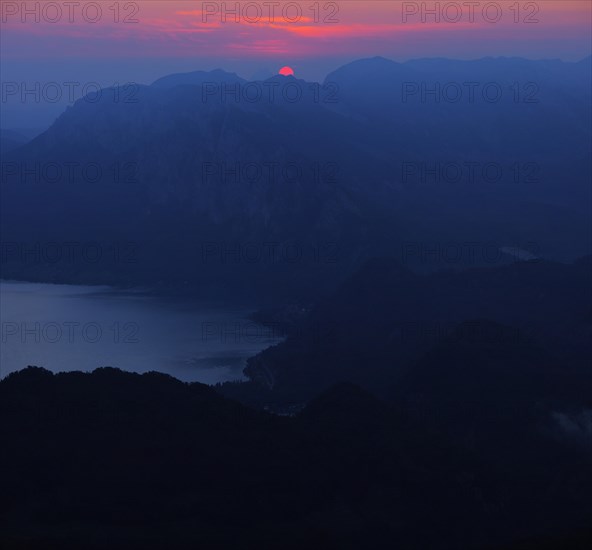 Sunrise over Attersee or Lake Atter and Hollengebirge mountain range