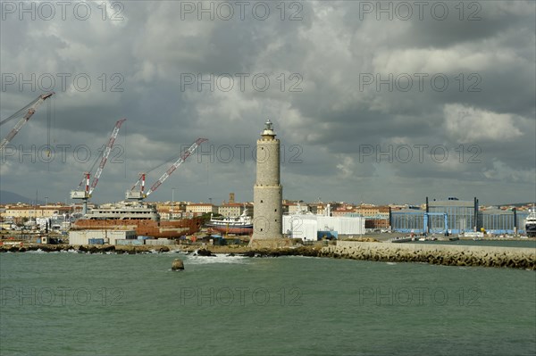 Pier and lighthouse in the port of Livorno