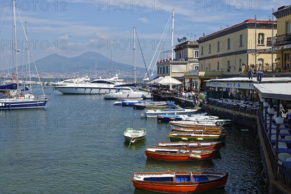 Restaurants and outdoor cafes along the harbor of Castel dell'Ovo