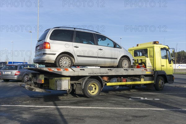 Car on tow-away vehicle