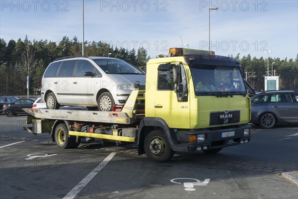 Car on tow-away vehicle