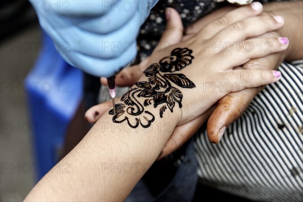 Henna tattoo on a woman's hand