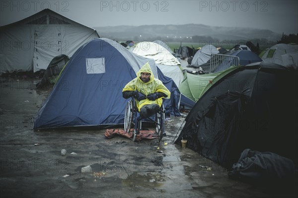 Afghan refugee who lost both legs in a bomb blast