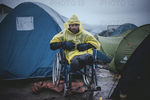 Afghan refugee who lost both legs in a bomb blast