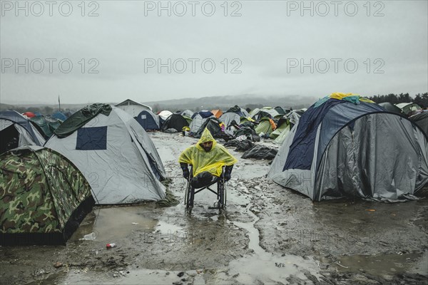 Afghan refugee who lost both legs in a bomb blast