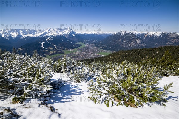 Townscape with the mountains Zugspitze and Alpspitze mountains